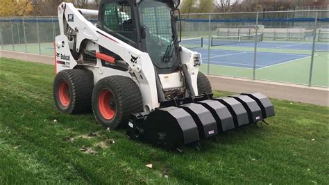 aerator skid steer|dingo mini skid steer attachments.